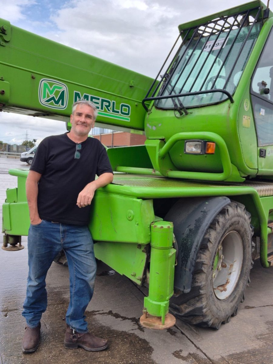 Rob McNinch with a Merlo telehandler at a UK machinery auction